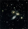 Слияние галактик в скоплении